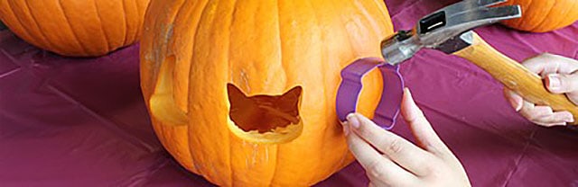 carving out pumpkin
