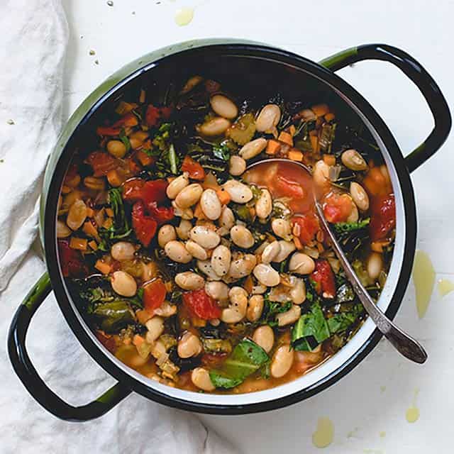 One Pot Tomato Collard and White Bean Stew