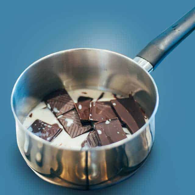 DYK Alternative Milk cooking pot of soy milk and chocolate