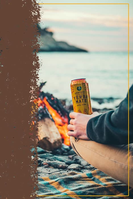 Holding Guayaki by a campfire