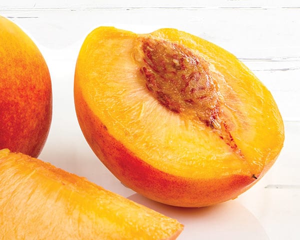 Stone fruit Peach on a table