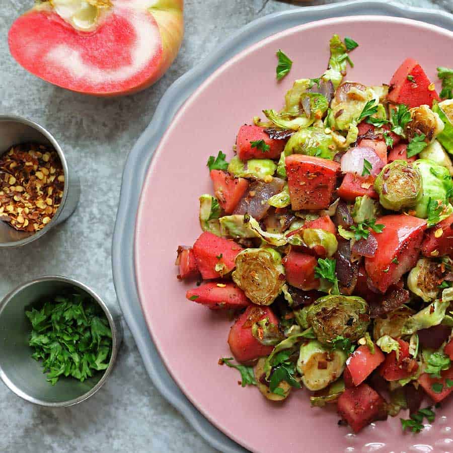 Apple Brussels Sprout Salad On pink Plate