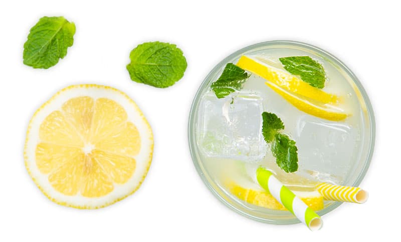 A glass of water with lemon and mint, perfect for your health goals. A glass of water with lemon and mint, perfect for your health goals.