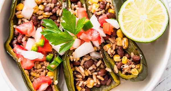 plant-based stuffed peppers on a plate