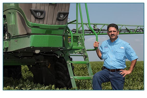 Duda farms worker in his field.