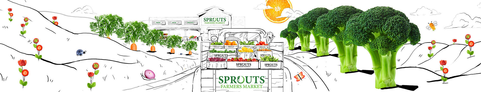 truck filled with produce driving up to a Sprouts store.