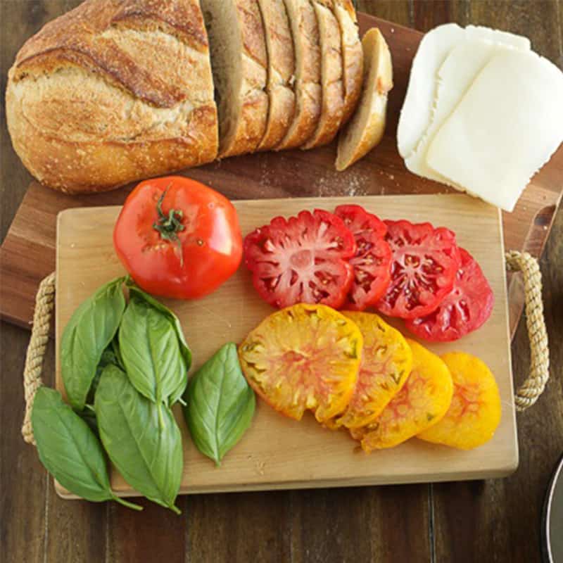 Caprese panini ingredients on cutting board