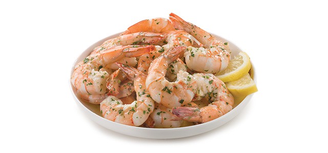shrimp in a bowl with lemon