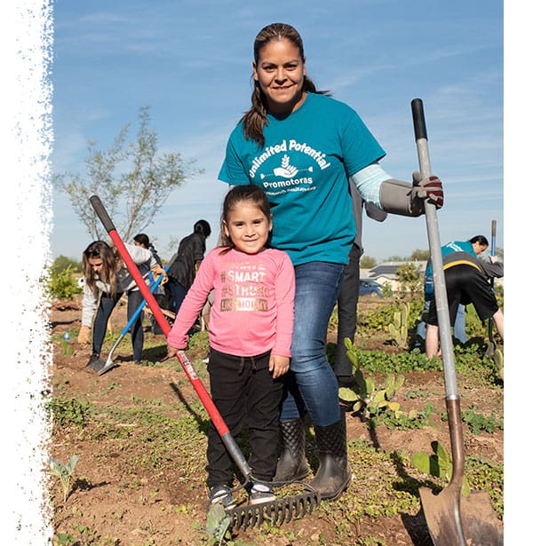 Child and adult gardening