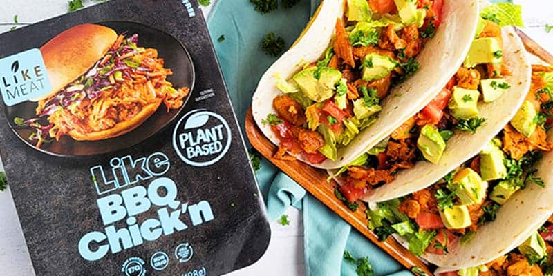 vegan BBQ chicken tacos next to a Like Meat BBQ chicken package