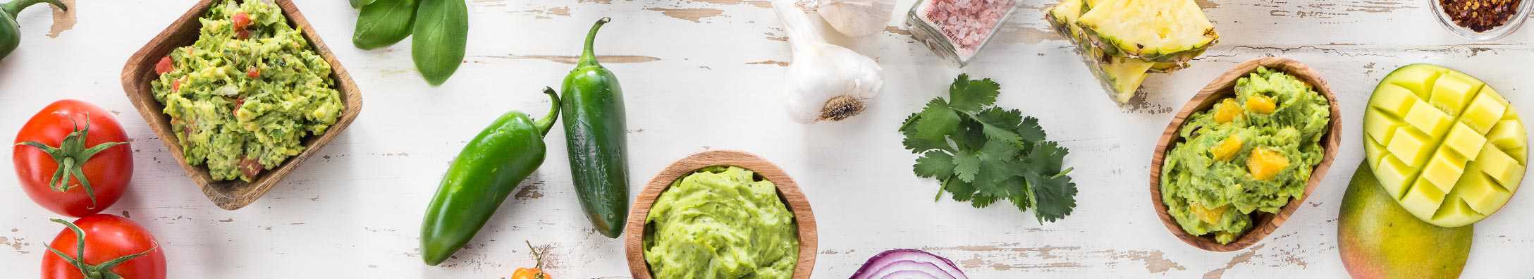 guacamole and produce on a tabletop