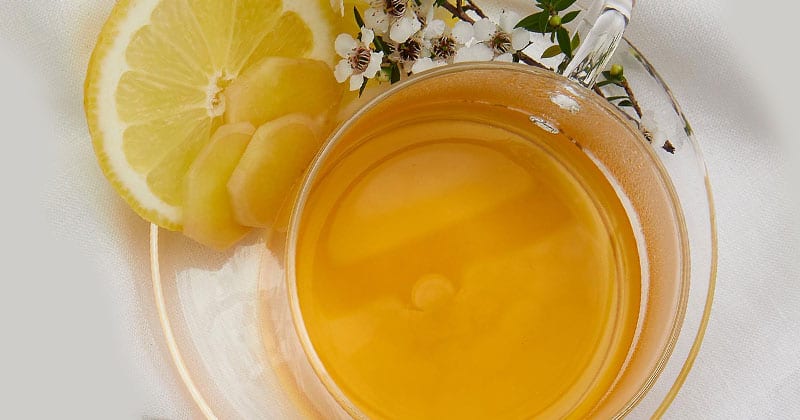 golden Mānuka elixir in a cup