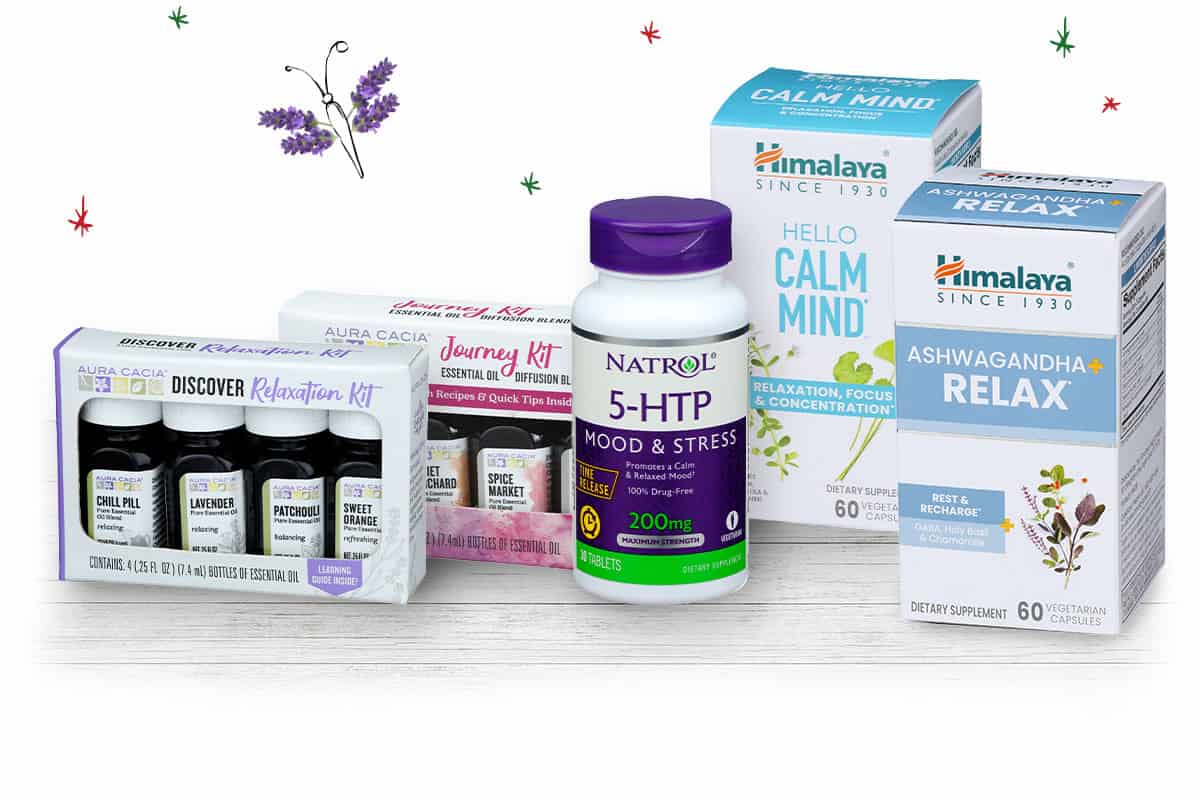 Aura Cacia, Himalaya and Natrol products on a table
