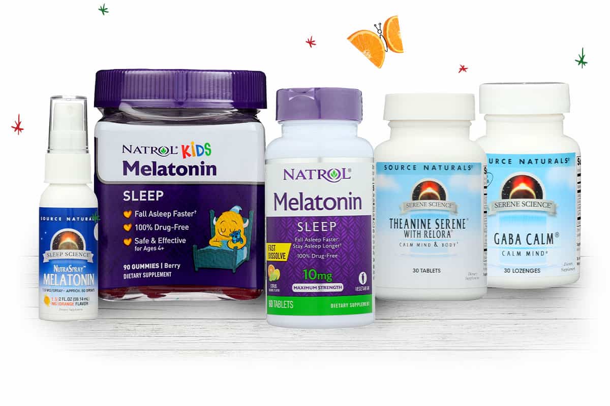 Natrol and Source Naturals products on a table