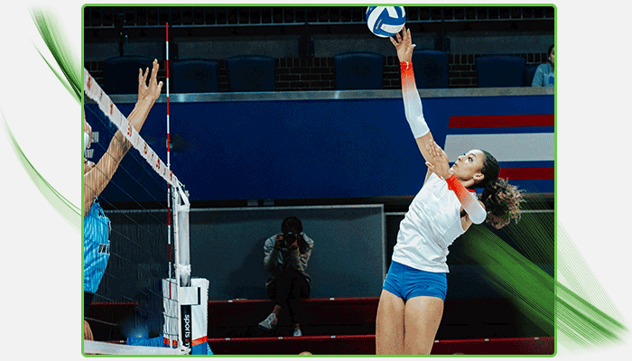 Alex Jean playing volleyball