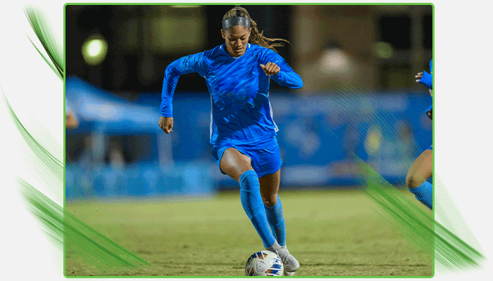 Reilyn playing soccer