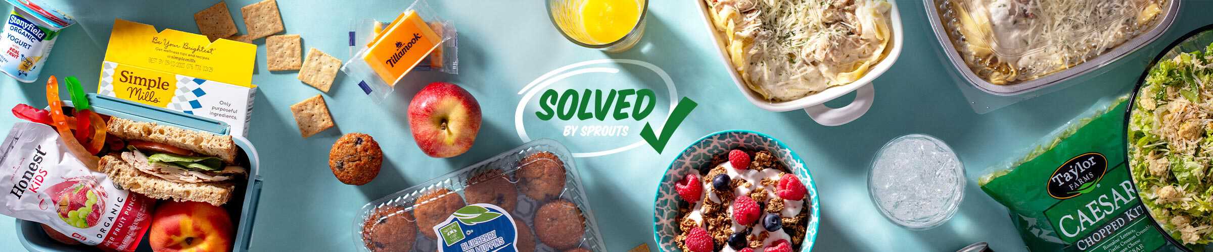 Solved by Sprouts logo alongside kids breakfast and lunch food