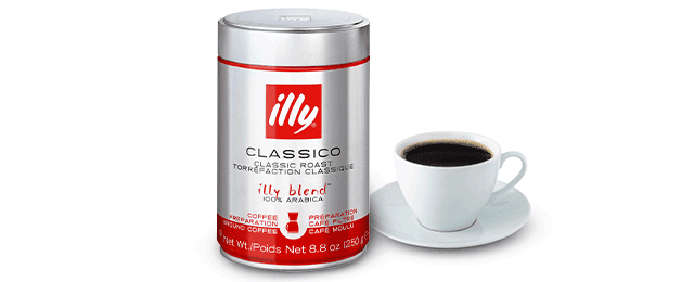 Illy classic roast coffee next to a coffee cup