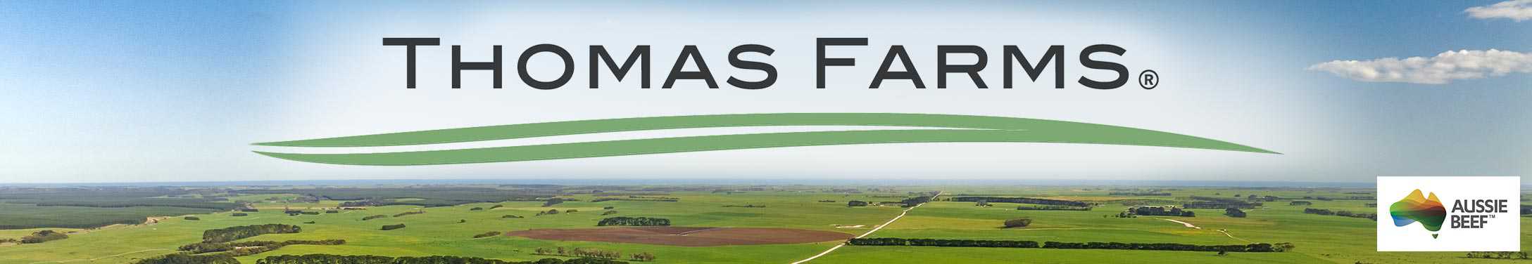 Thomas Farms logo and Aussie Beef logo above Australia farmland