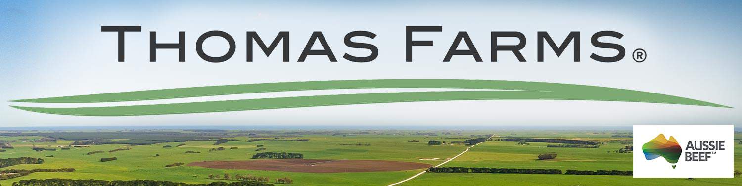Thomas Farms logo and Aussie Beef logo above Australia farmland