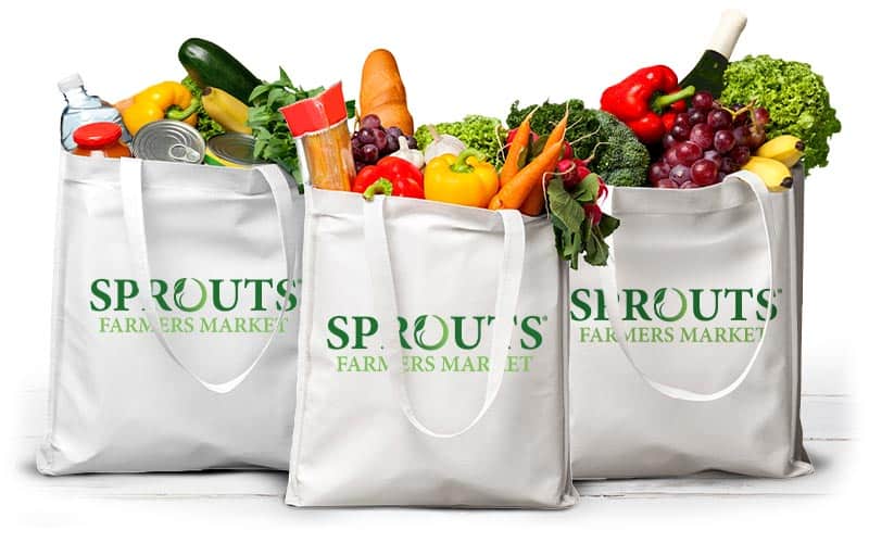 Canvas grocery bags filled with produce