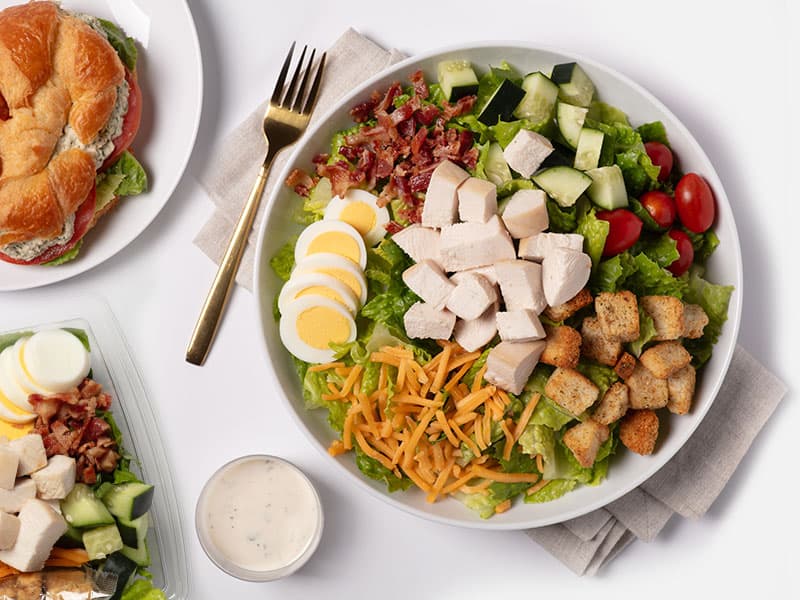 Salad and sandwich on a plate