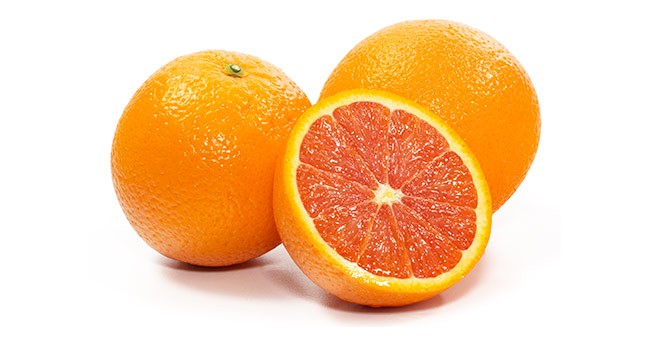 whole and sliced cara cara oranges