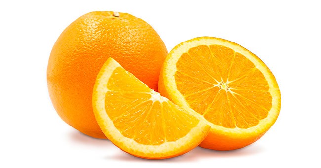 whole and sliced navel oranges