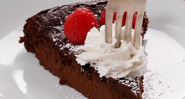 flourless dairy-free chocolate cake on a plate