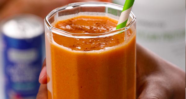 Banana carrot smoothie in a glass