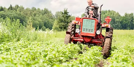 regenerative agriculture farmer on a tractor