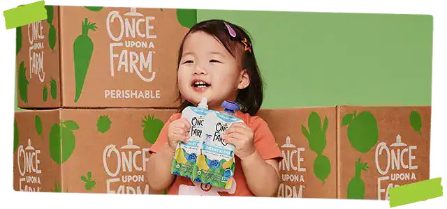 Child holding food pouches