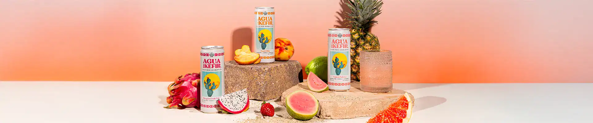 Aqua de Kefir surrounded by fruits