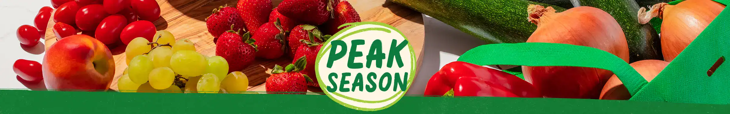 peak season produce logo surrounded by produce