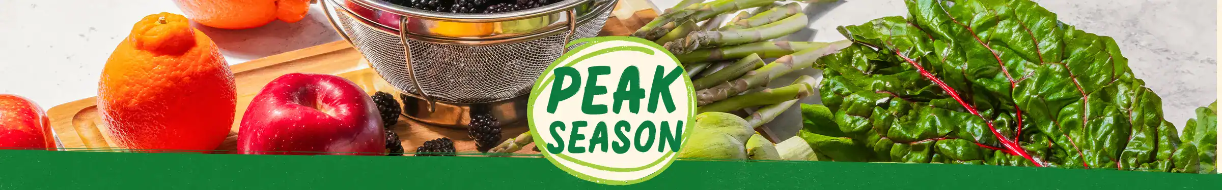 Peak season produce logo surrounded by produce