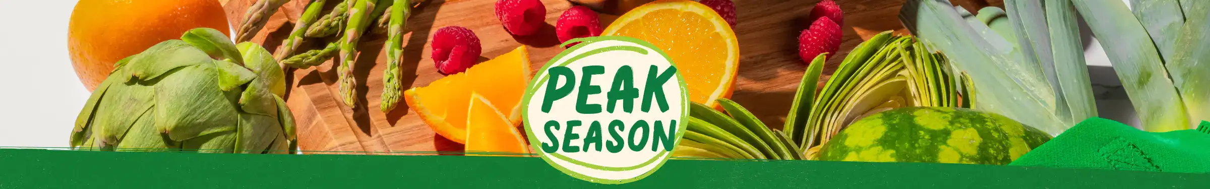 peak season logo surrounded by produce
