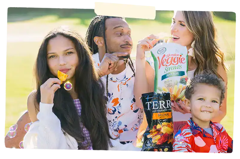Family eating Terra and Veggie Straw snacks
