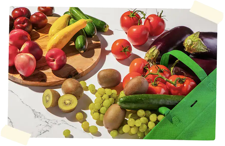 Peak Season Produce spilling out of a reusable bag