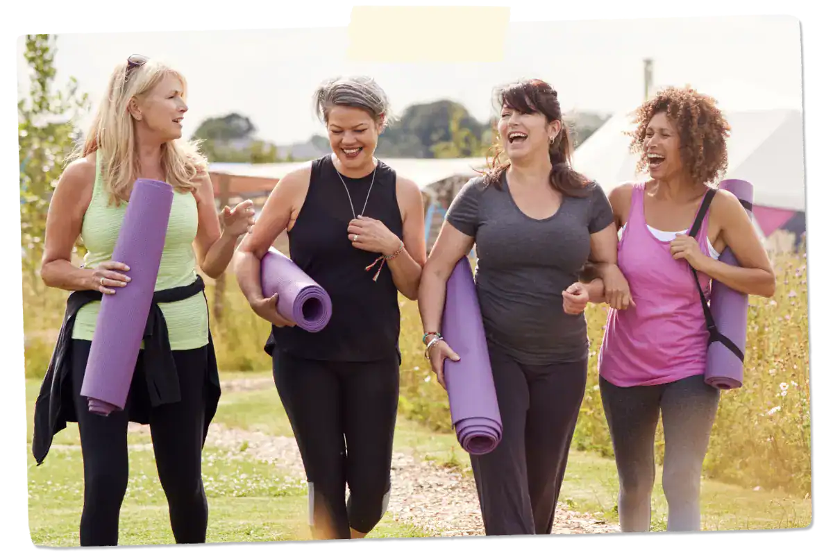 women walking together after a yoga class